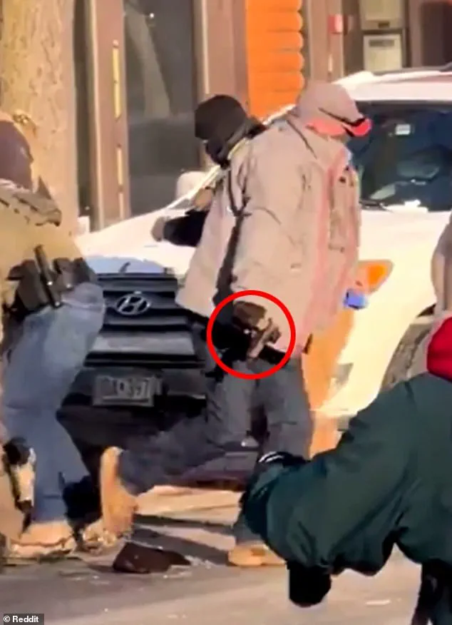 Fatal Shooting of Minneapolis Nurse by Border Patrol Sparks Debate Over Whether He Brandished Handgun