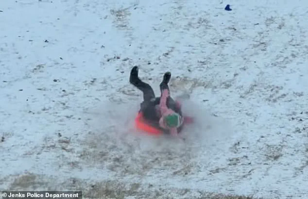 Oklahoma Police Officer Accidentally Sledding into Child in Viral Video Highlights Winter Weather Challenges
