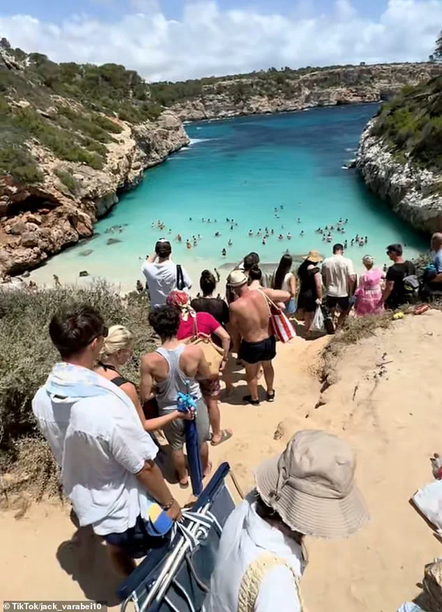 Overcrowded Mallorca Beach: Owners Apply to Restrict Access Due to Environmental Damage and Social Media's Impact