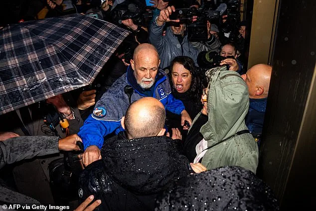 Mob of Grieving Families Confront Club Owners at Prosecutor's Office in Deadly Fire That Killed 41