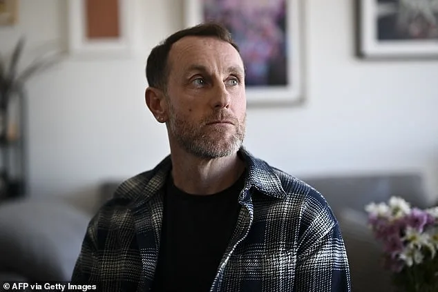 Music Programmer Survives Miraculous Rescue After Being Shoved Onto Tracks in Manhattan