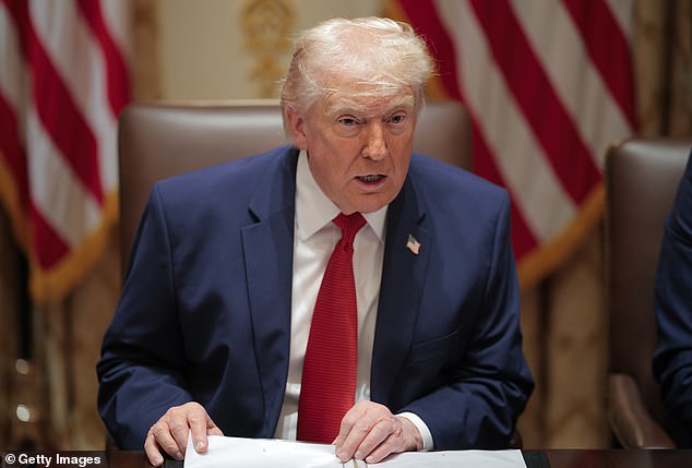 Iran strikes US base as Trump urges critics to relax.