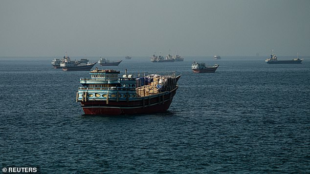 Iran strikes US base as Trump urges critics to relax.