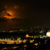 Israeli Air Defense Intercepts Iranian Rockets, Marking Escalation in Tensions