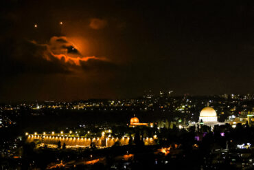 Israeli Air Defense Intercepts Iranian Rockets, Marking Escalation in Tensions
