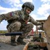 Unexpected Cultural Exchange at Ukraine's Front Lines: Russian Soldier Sings 'Katyusha' in Viral Footage