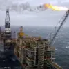 Trump Criticizes UK Fossil Fuel Taxes, Sparks Debate on Economic and Environmental Impacts