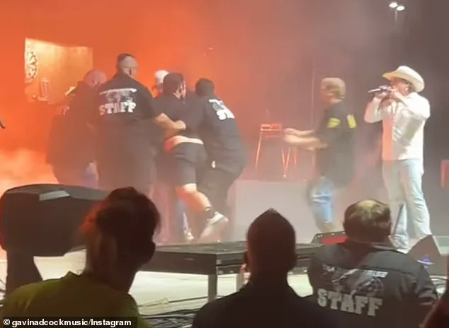 Exclusive Security Footage Reveals Intoxicated Man Rushes Stage During Gavin Adcock Concert in Wichita