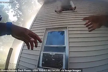 Local Authorities Release Bodycam Footage of Dramatic Fire Rescue, Sparking Debate on Emergency Response Transparency
