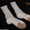 Michael Jackson's Dirty Sock Sells for £6,600 at French Auction, Surpassing Expectations